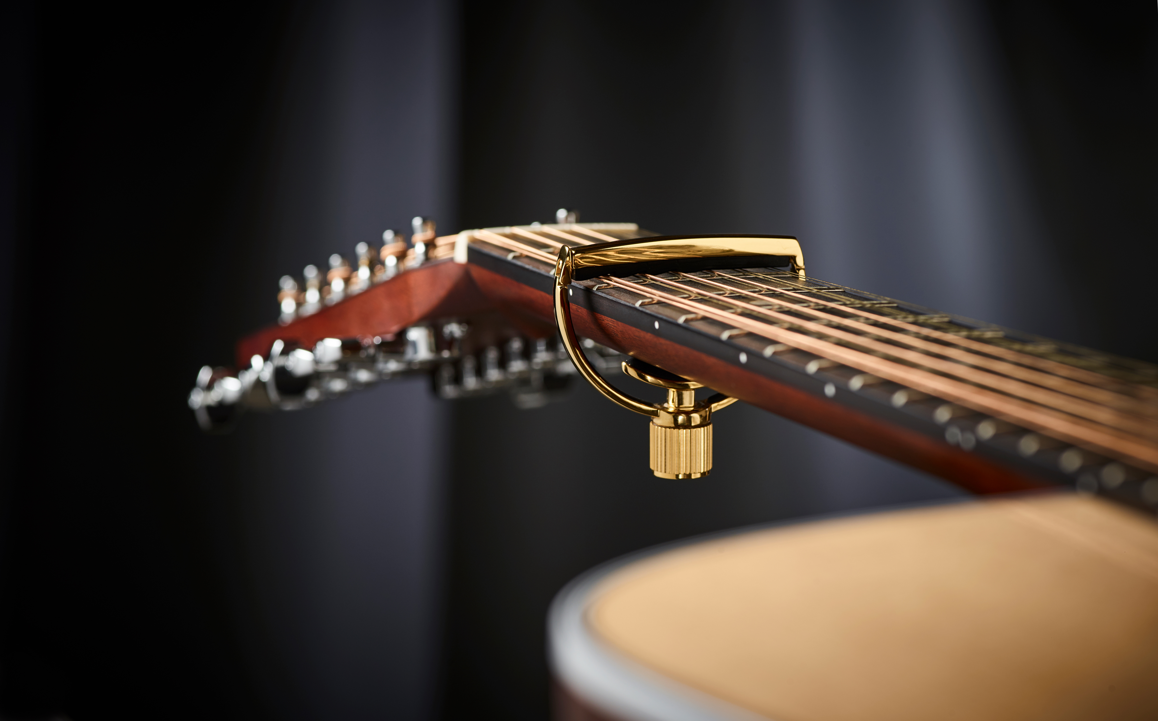 Heritage (12 String Guitar 18kt Gold Plate) on guitar